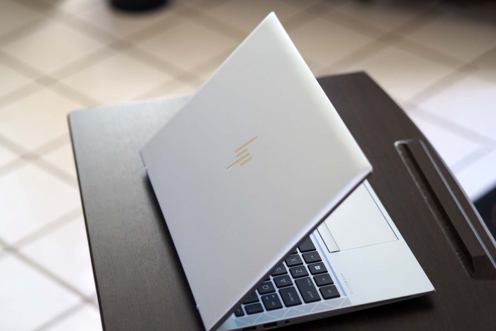 HP EliteBook 840 Aero G8 sitting on desk. Backside view of top/lid.